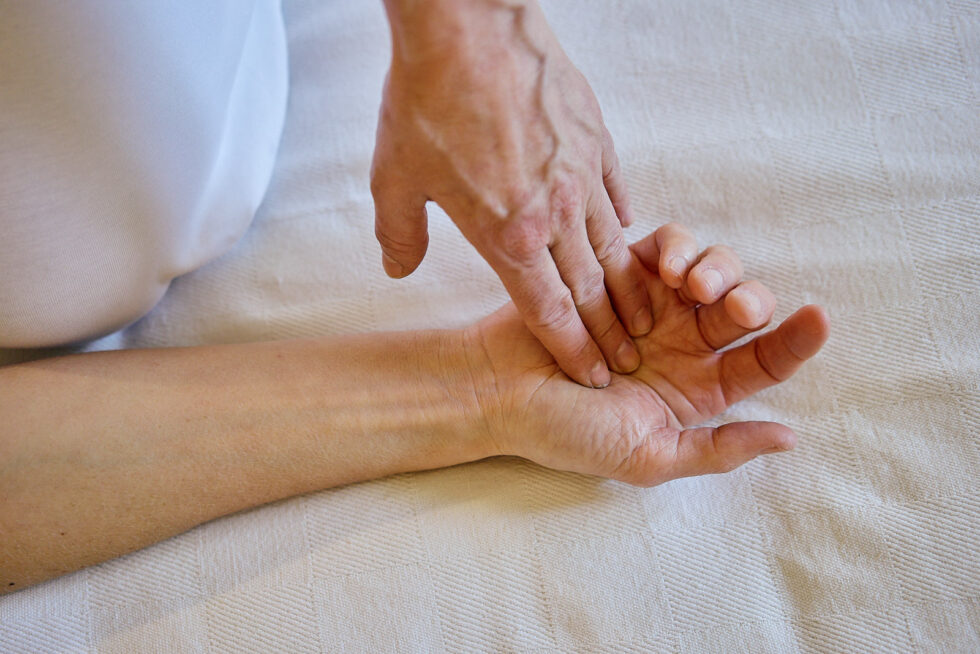 Shiatsu-Behandlung Detailaufnahme Hand
